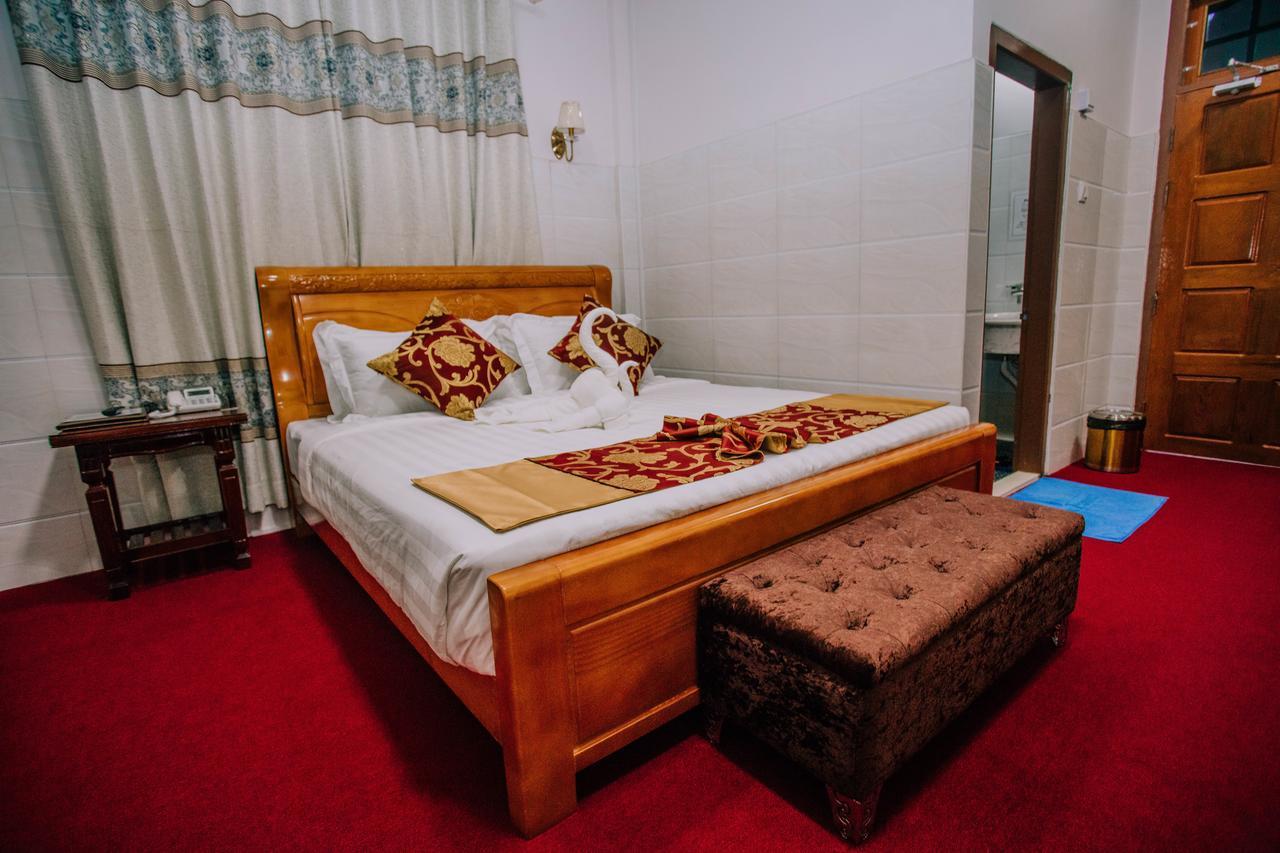 Amber Palace Hotel มิตจีนา ภายนอก รูปภาพ