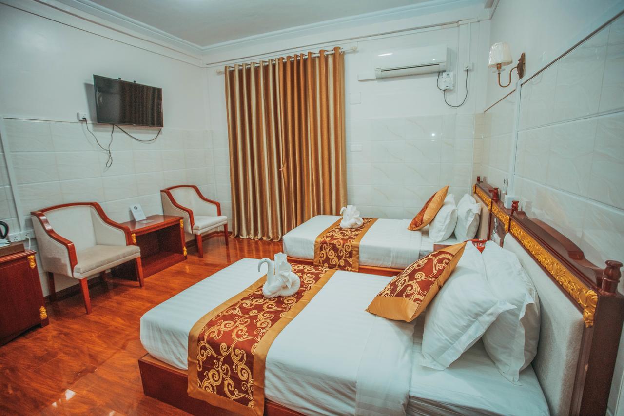 Amber Palace Hotel มิตจีนา ภายนอก รูปภาพ