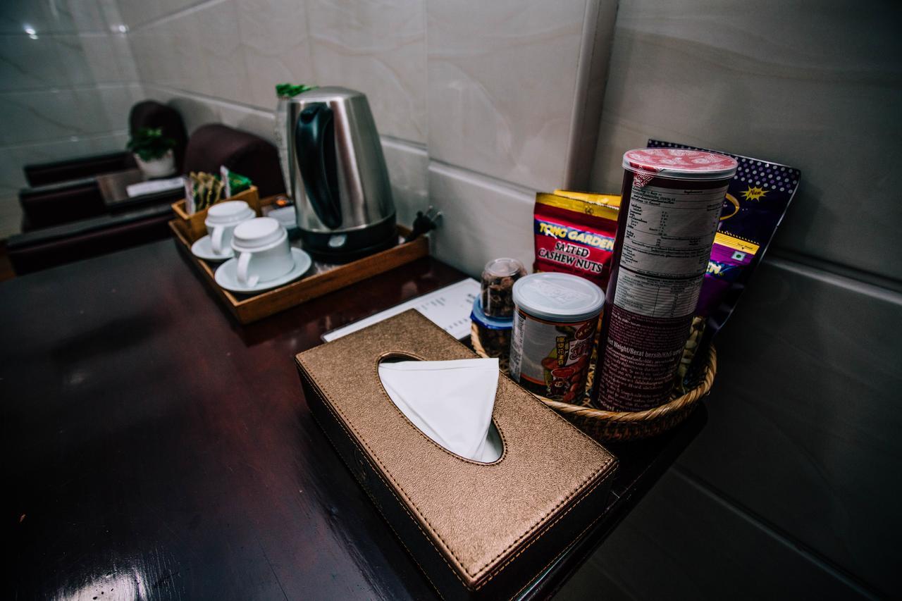 Amber Palace Hotel มิตจีนา ภายนอก รูปภาพ