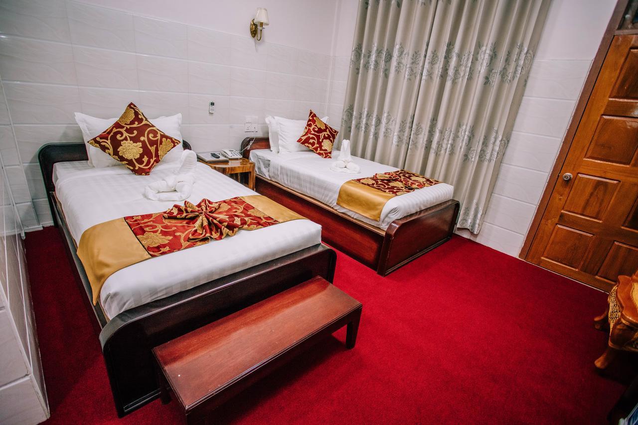 Amber Palace Hotel มิตจีนา ภายนอก รูปภาพ
